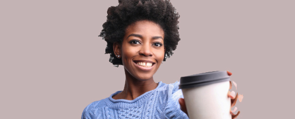 Woman smiling with coffee