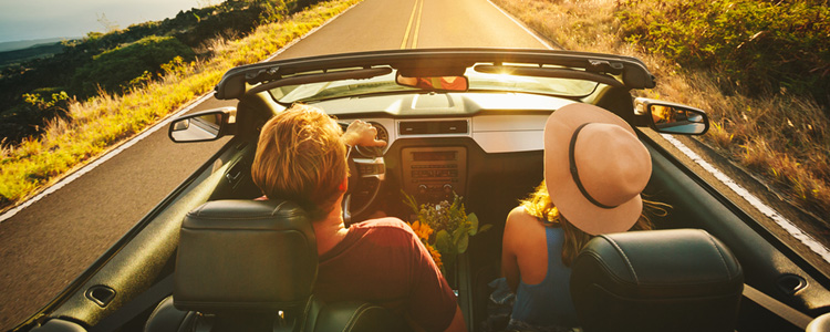 Couple enjoying a summer road trip